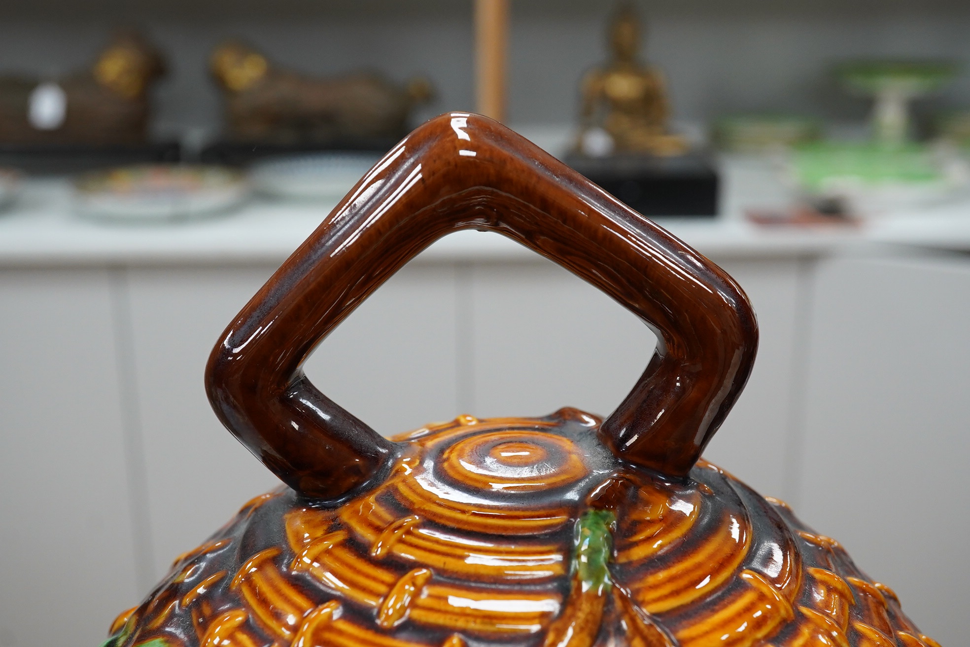 A Minton style majolica cheese dome and stand, 32cm. Condition - fair to good, some crazing